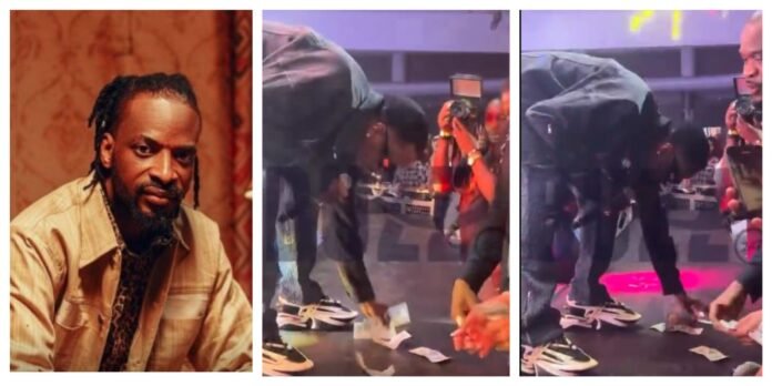 ‘If E Reach Your Turn No Pick’ – Singer 9ice Spotted Picking Dollars During Performance, Sparks Nigerians Reaction