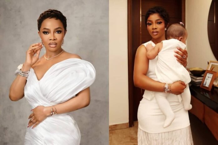 Get Help – Toke Makinwa Replies Fan Who Condemned Her For Hiding Baby’s Face